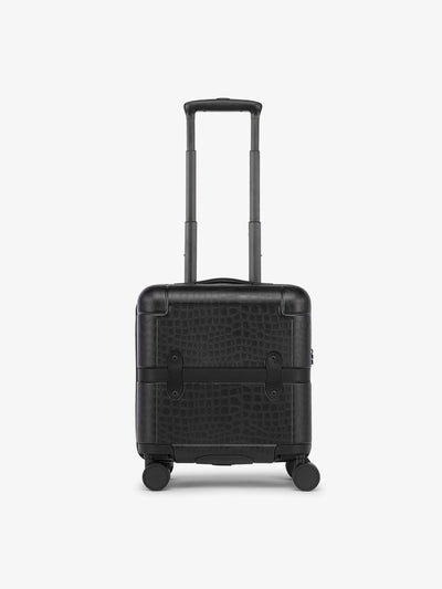 CALPAK TRNK mini carry on luggage with faux-crocodile design in black