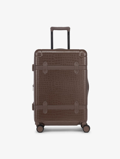 CALPAK TRNK medium 25 inch luggage with 360 spinner wheels and faux crocodile design in vintage trunk style in espresso; LTK1024-ESPRESSO