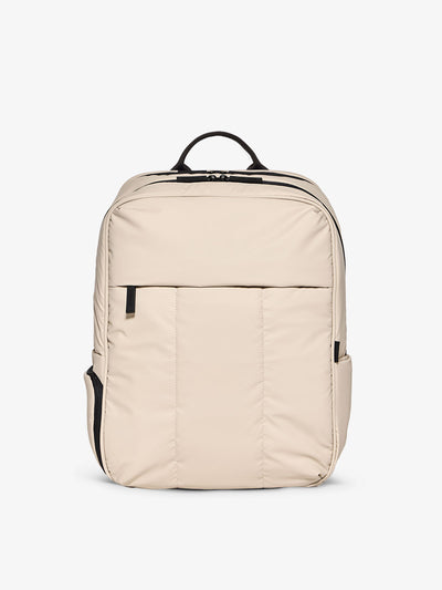 CALPAK Luka 17 inch Laptop Backpack featuring soft, puffy exterior and water resistant lining in oatmeal