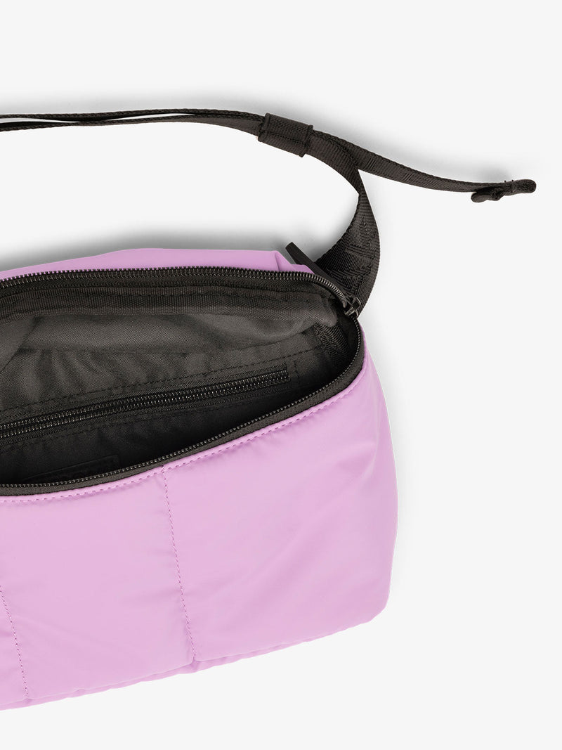 CALPAK Luka Belt Bag close up interior and strap in pink