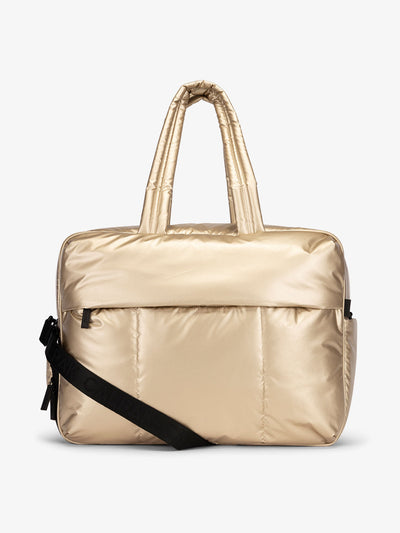 CALPAK Luka large duffle bag with detachable strap and zippered front pocket in metallic gold; DLL2201-GOLD view 1