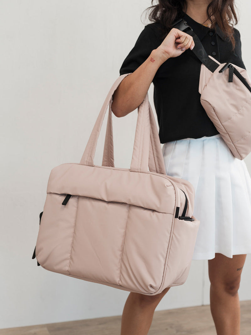 pink CALPAK Luka duffel bag