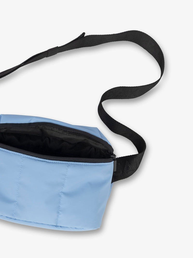 CALPAK Luka small fanny pack for travel in winter sky blue