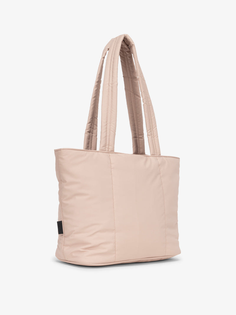 Pink CALPAK Luka Mini Tote with durable padded shoulder straps