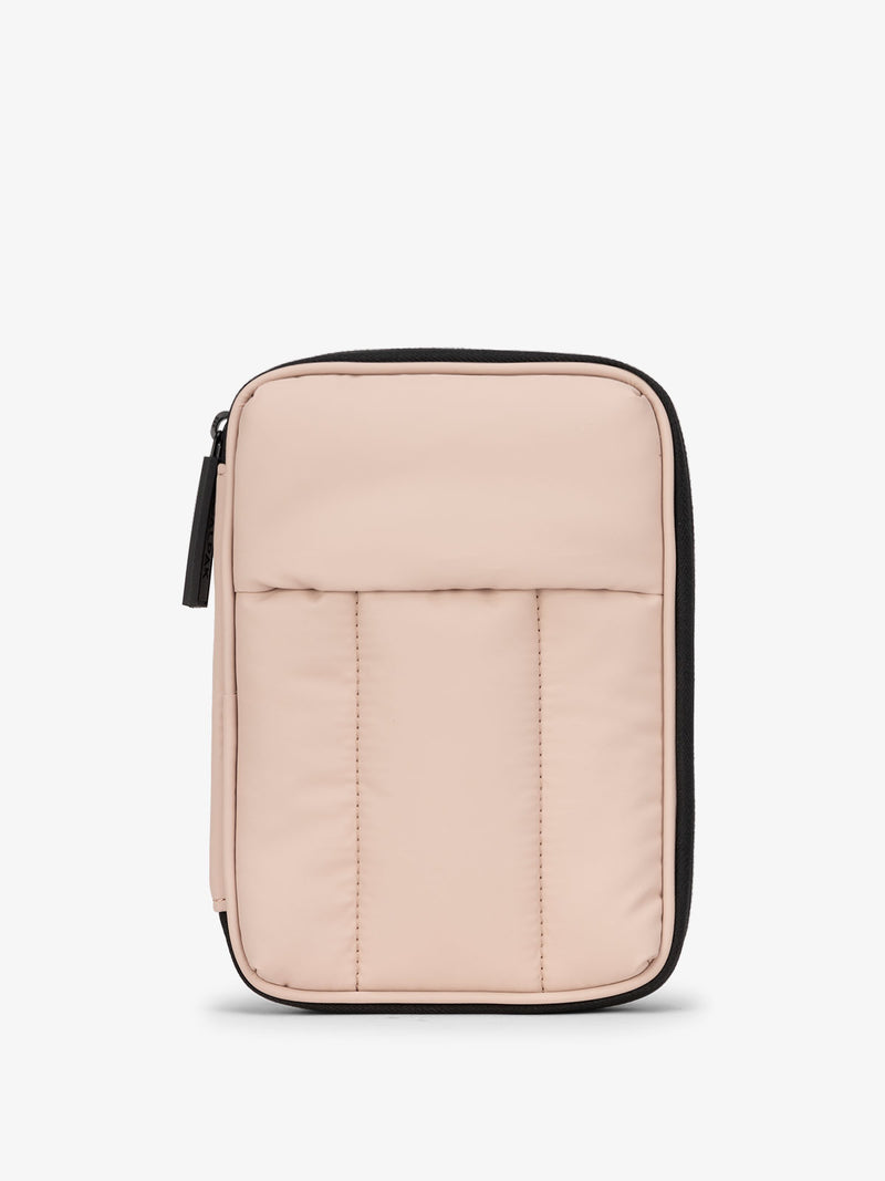 CALPAK Luka Zippered Passport Wallet with soft, puffy exterior in rose quartz