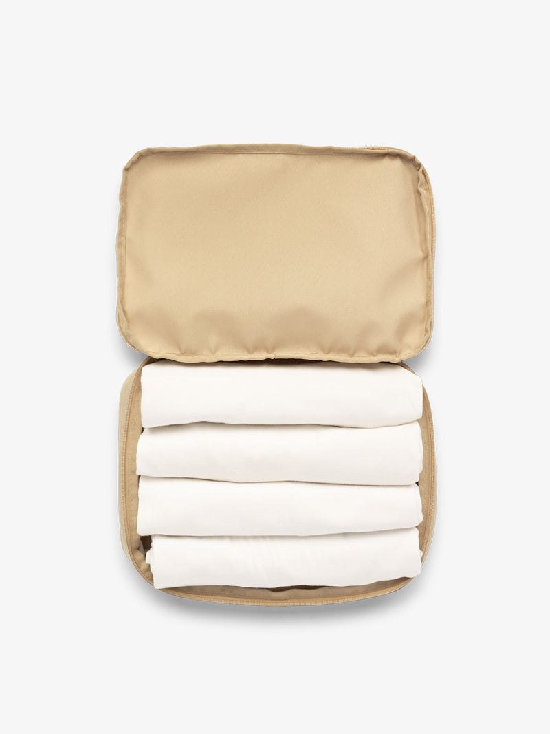 CALPAK packing cubes for travel in beige oatmeal