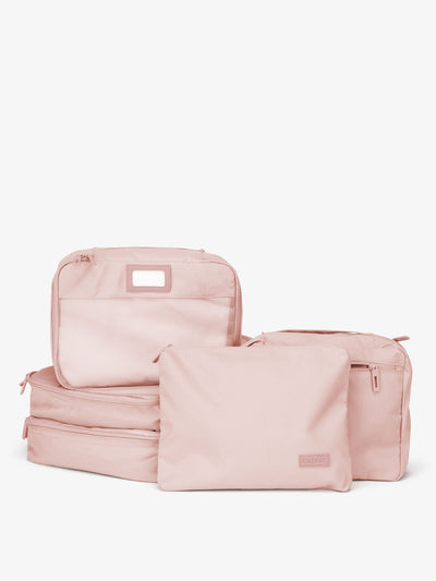 CALPAK's packing cube set in pink