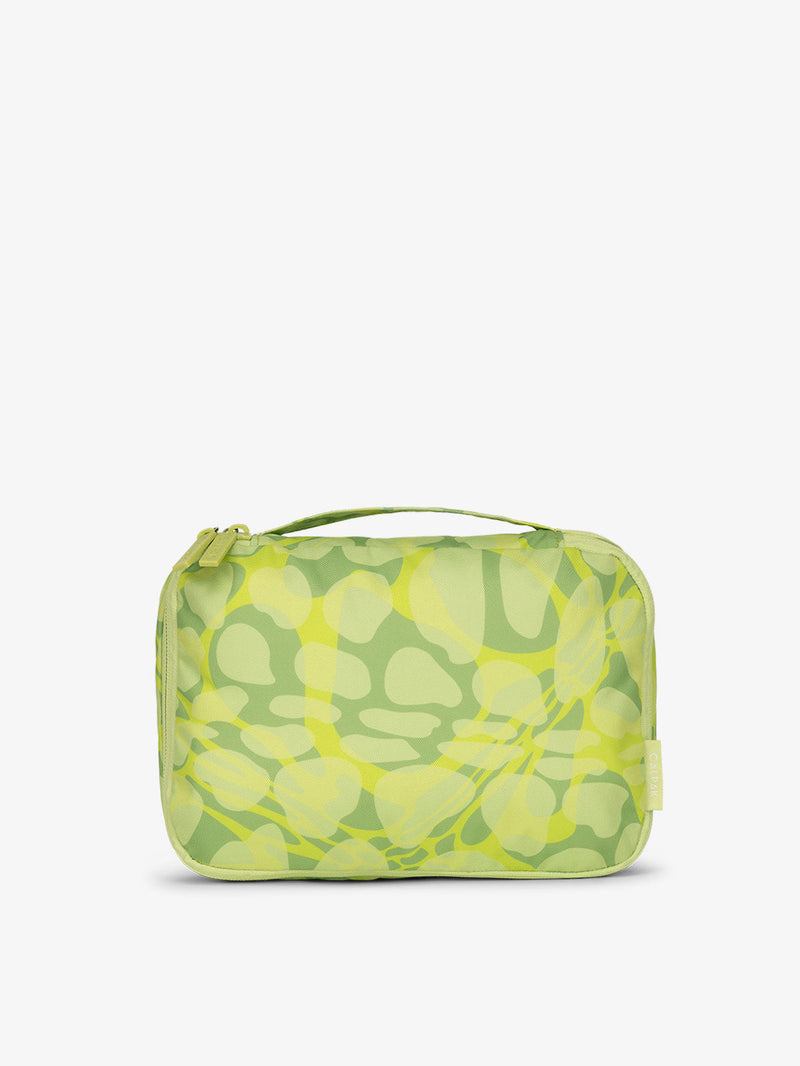 CALPAK small packing cubes with top handle in abstract print green