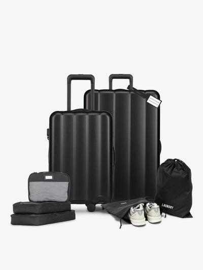 CALPAK starter bundle with carry-on, large luggage, packing cubes, pouches, and luggage tag; LCO8000-BLACK view 1