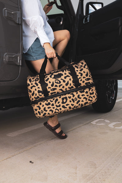 cheetah print CALPAK Stevyn duffel bag; DST7019-CHEETAH