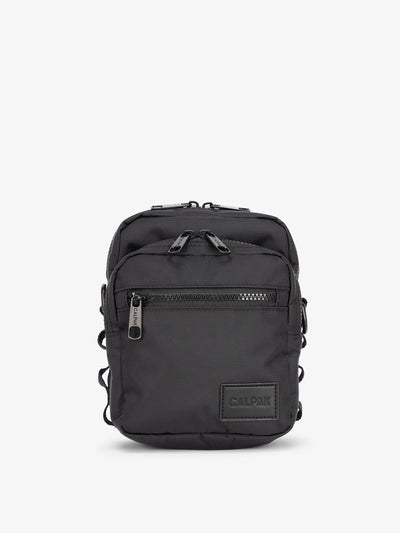 Front-view of CALPAK Stevyn Mini Crossbody Bag in black; ACS2301-BLACK