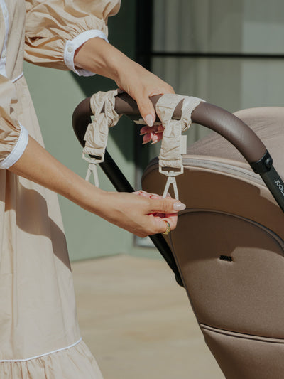 CALPAK Stroller Straps for Diaper Bag made with Oeko-Tex certified, recycled, and water-resistant materials in oatmeal; STP2401-OATMEAL