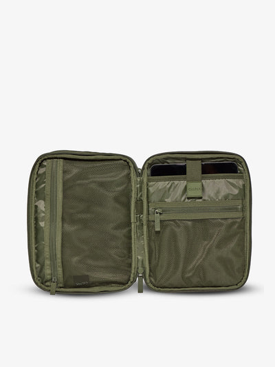 Interior of tablet organizer with zippered pockets and padded tablet sleeve in moss by CALPAK