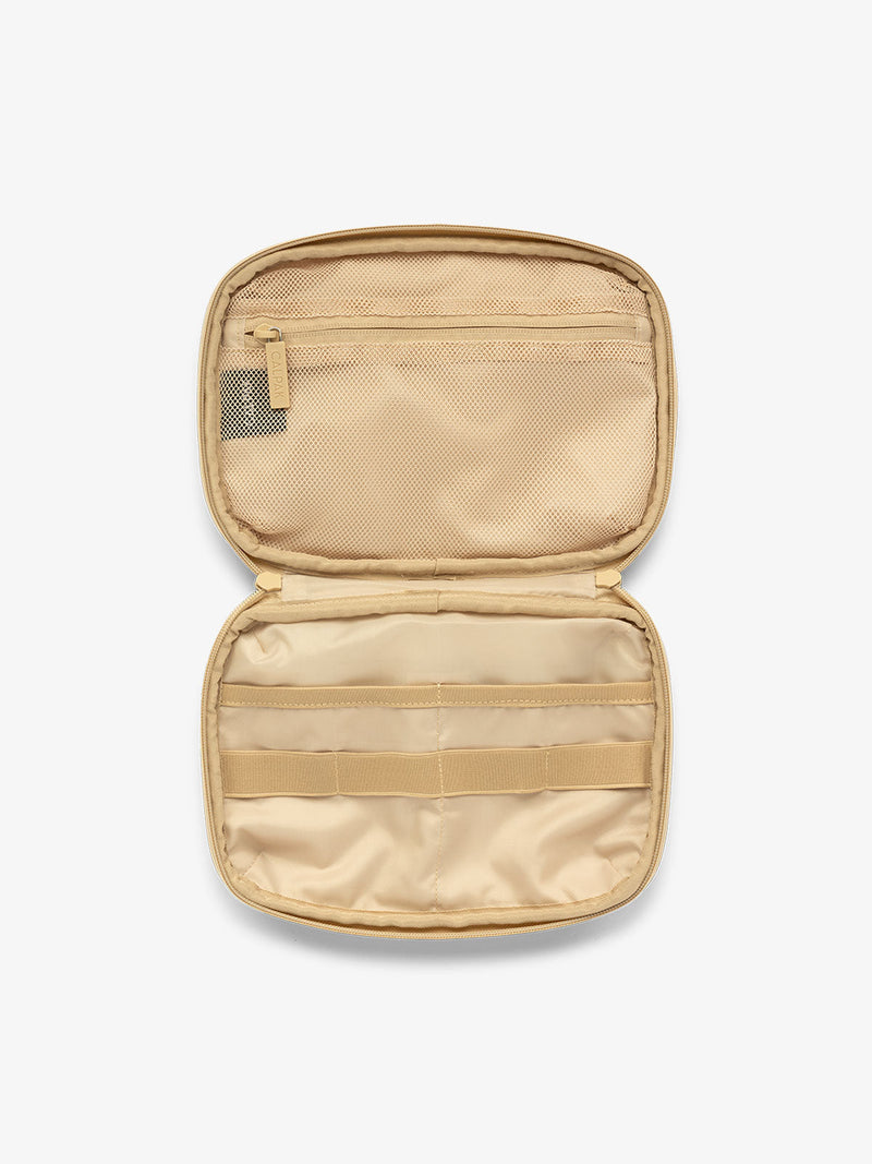 CALPAK tech and electronics organizer for travel in beige oatmeal