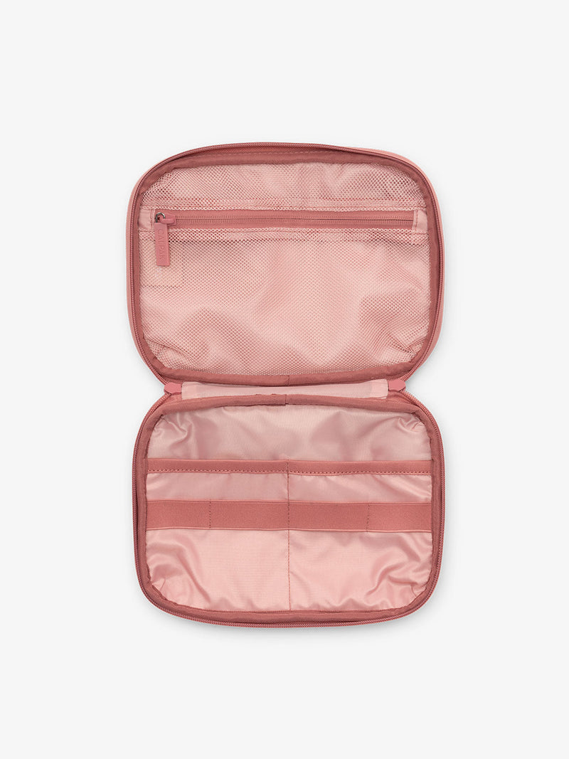 CALPAK tech and electronics organizer for travel in pink tea rose