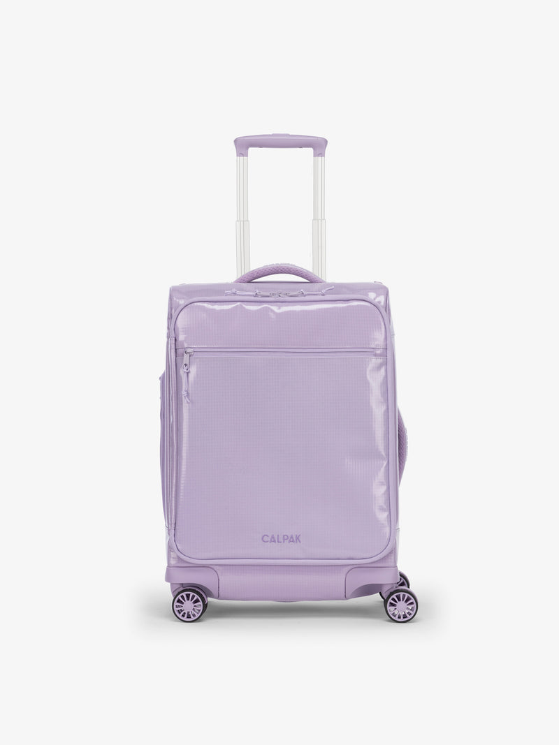 Studio product shot of front-facing CALPAK Terra 35L Carry-On luggage with soft shell and 360 spinner wheels in light purple amethyst