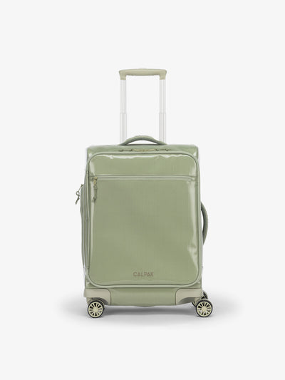 Studio product shot of back-facing CALPAK Terra 35L Carry-On luggage with soft shell and 360 spinner wheels in olive green juniper; LTR1020-JUNIPER view 1