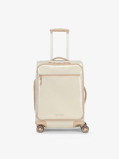 Studio product shot of front-facing CALPAK Terra 35L Carry-On luggage with soft shell and 360 spinner wheels in white sands beige; LTR1020-WHITE-SANDS view 1