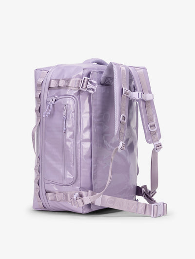 CALPAK Terra Large 50L Duffel Backpack with multiple exterior pockets and adjustable sternum strap in amethyst