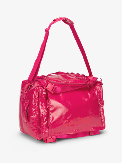 Pink dragonfruit CALPAK terra large 50L duffel backpack with removable and adjustable body shoulder strap