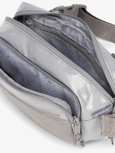 CALPAK Terra hiking belt bag with multiple interior pockets and water resistant exterior in storm gray