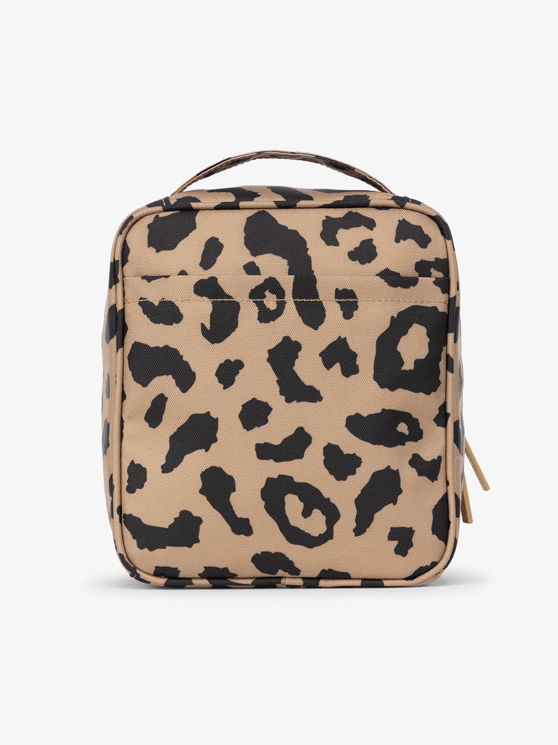 Backview of CALPAK The Everything Cube with exterior back slip pocket in  cheetah print