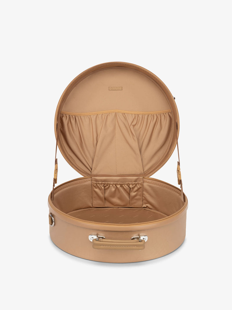 interior of beige almond CALPAK Trnk Medium Hat Box for travel