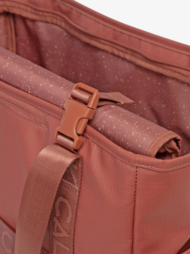 CALPAK Terra 35L Water Resistant Zippered Tote Bag in red and orange Matte Clay strap detail