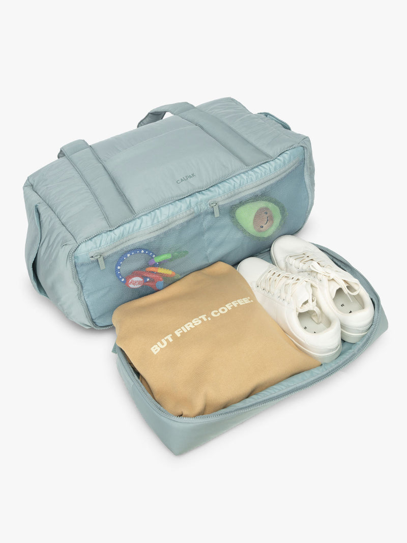 CALPAK Weekender Duffel interior in light blue Bluebell
