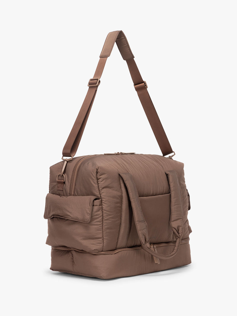 CALPAK Weekender Duffel side view in brown hazelnut