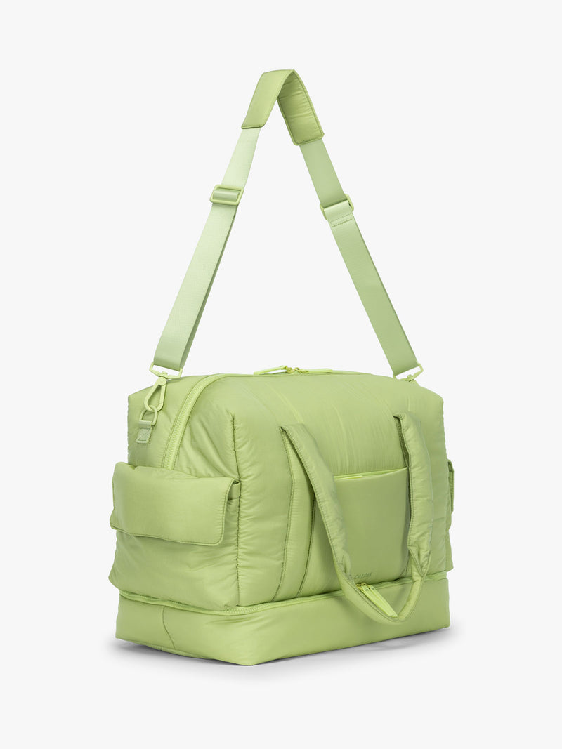 CALPAK Weekender Duffel side view in light green Lime