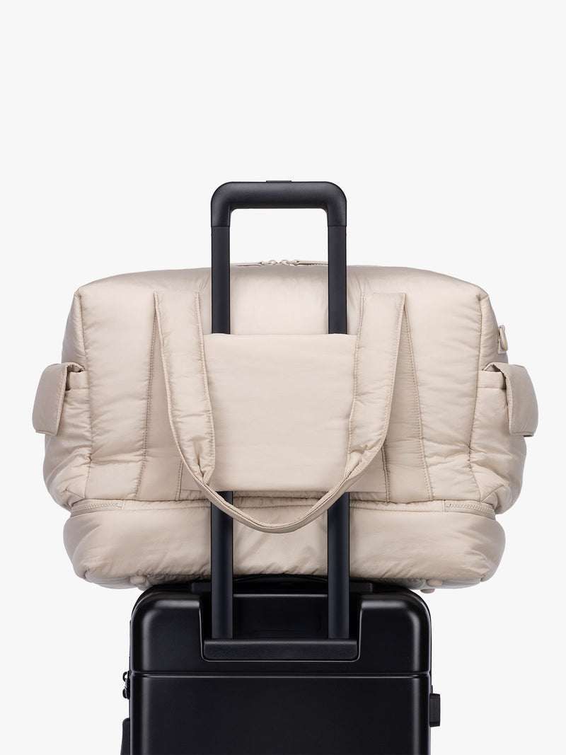 CALPAK Weekender Duffel trolley sleeve in white Oatmeal