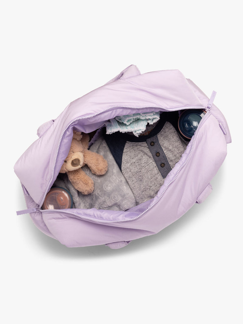 CALPAK Weekender Duffel top with open zipper in light purple Orchid