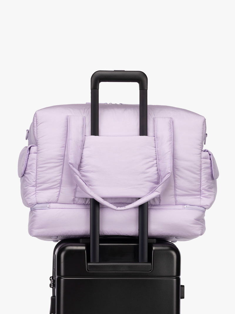 CALPAK Weekender Duffel with trolley sleeve in light purple Orchid