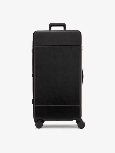 CALPAK Hue 31 inch hardside polycarbonate trunk luggage in black color; LHU1030-BLACK view 1