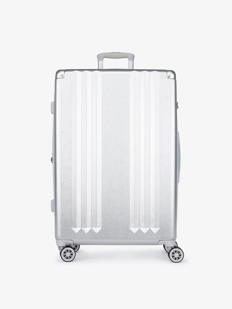 CALPAK Ambeur large silver hard shell suitcase part of 3 piece luggage set