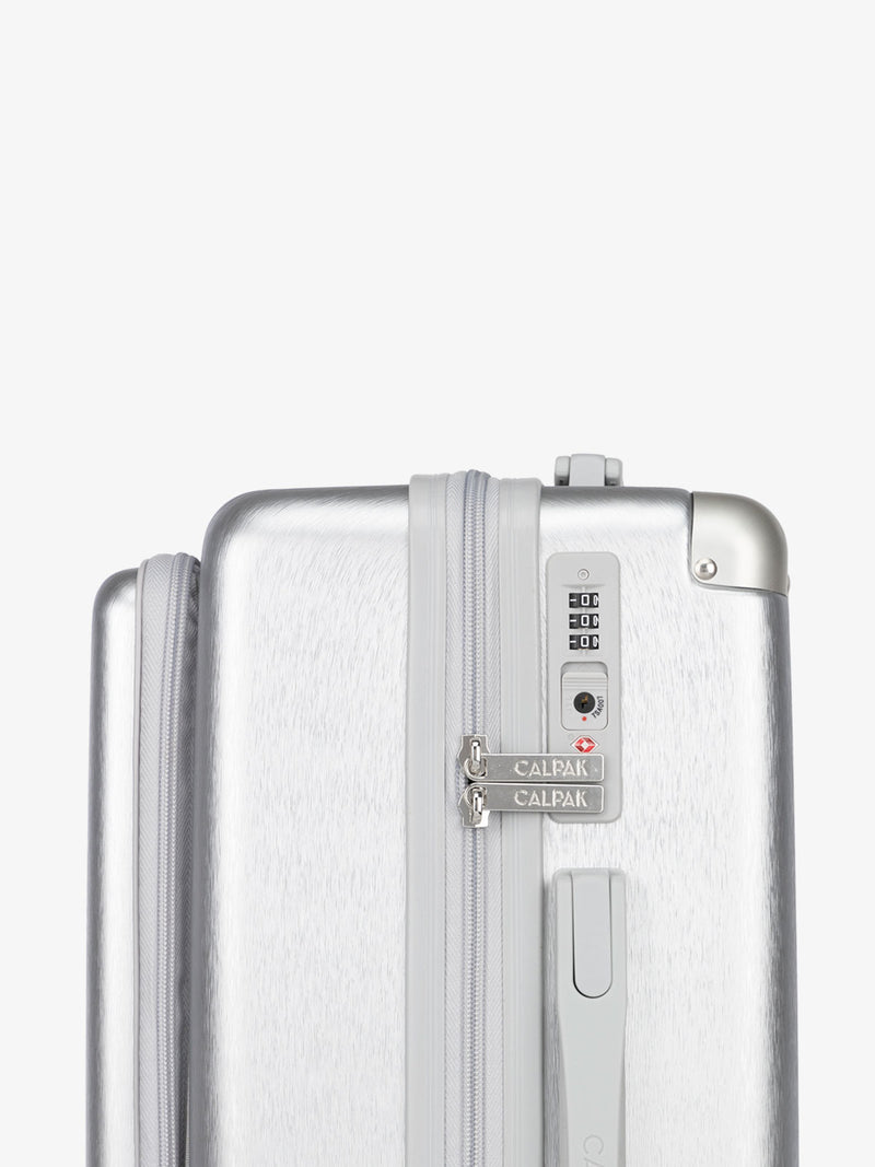 CALPAK Ambuer hardside 21 inch carry-on with front pocket and TSA lock in silver