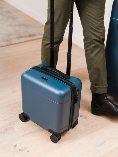 CALPAK carry on spinner mini luggage in atlantic blue