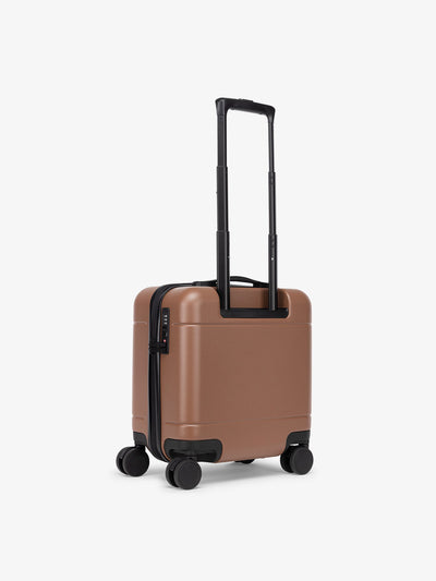 small CALPAK carry on luggage with 360 spinner wheels