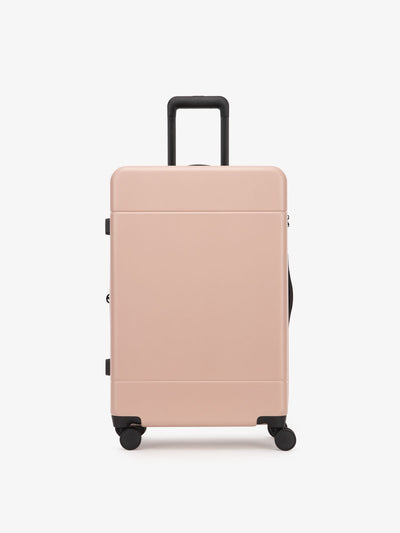 medium 26 inch hardside polycarbonate luggage in pink sand color from CALPAK Hue collection; LHU1024-PINK-SAND